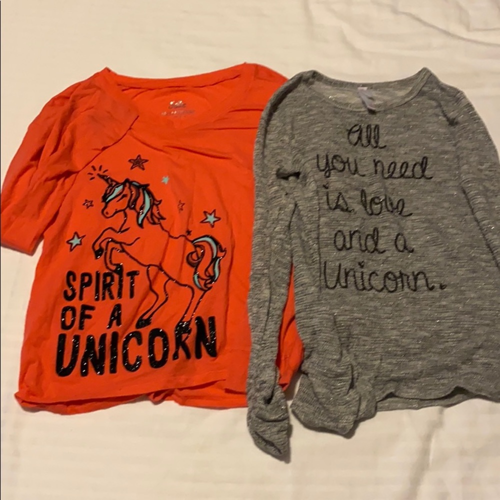Two girls unicorn theme shirts